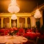 Placeholder: Party in a ballroom, Austrian aesthetic, warm colors, 8k, HD, cinematography, photorealistic, Cinematic, Color Grading, Ultra-Wide Angle, Depth of Field, hyper-detailed, beautifully color-coded, insane details, intricate details, beautifully color graded, Cinematic, Color Grading, Editorial Photography, Depth of Field, DOF, Tilt Blur, White Balance, 32k, Super-Resolution, Megapixel, ProPhoto RGB, VR, Halfrear Lighting, Backlight, Na