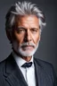 Placeholder: portrait of a 55 year old man with salt and pepper hair. His beard is neatly trimmed and he is smartly dressed.