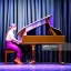 Placeholder: woman playing piano on stage