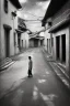 Placeholder: Black & white man walks on road's chinese village with playing light and shadow as ho fan style