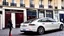 Placeholder: A Tesla's 'Model S Plaid' is doing donuts, by the 'Sacre Coeur', in Paris. CINEMATIC. WIDE ANGLE LENS. PHOTO REAL.