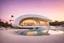 Placeholder: An organic banana-shaped house seamlessly integrated beside beach with pastel hues during sunset, modernist architecture with large curved windows, casting warm sunlight on the structure, emphasizing its sleek design and blending with the natural surroundings, Architectural photography, real photography, photo real