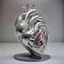 Placeholder: stainless steel sculpture of human flesh-like heart formed by human bodies