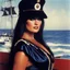 Placeholder: on the ship: the raven haired curvy temptress Caroline Munro who featured in a series of photo adverts for Lamb’s Navy Rum. Basically she was a femme fatale who wore a series of skimpy naval attire