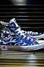 Placeholder: A converse sneaker, covered in Dallas cowboys theme