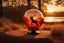 Placeholder: a globe made of glowing orange-red salt material covered in gold lace, about 60% of which is visible, with a glowing light inside, double exposure, in the foreground a black silhouette of a deer jumping dynamically, in the background a landscape with a beautiful forest and a waterfall in the sunlight