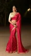 Placeholder: A regal supermodel stands beneath the soft glow of twilight, exuding poise and timeless allure. She wears an elegant ivory blouse adorned with delicate hand embroidery and subtle pearl detailing that shimmers with understated opulence. Her crimson silk saree flows in luxurious folds, the rich hue catching the light with every movement. The saree's border features intricate scalloped gold zari work that lends depth and grandeur to the ensemble. Her jewelry is steeped in tradition: an antique gold