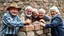 Placeholder: Elderly pensioners building a wall. Everyone is happy. Photographic quality and detail, award-winning image, beautiful composition.