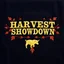 Placeholder: an autumn colored textured cloth embroidered ornamental leaves and cattle, pointed bottom, on dark background, embroidered text across top "HARVEST SHOWDOWN" block text, Canadian western cowboy style