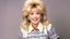 Placeholder: An official photoshoot for the ABC sitcom, Home Improvement. youthful Dolly Parton as Lisa