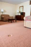 Placeholder: cheap motel room floor, furniture dents in carpet, showing where furniture had been moved from