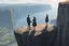 Placeholder: Only one guy and a girl are standing on the edge of a cliff and holding hands