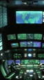 Placeholder: Inside a spaceship control room a chimpanzee pilot sitting on the control of big screen showing plant earth very close