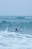 Placeholder: Rain and storm in an ocean with high waves , a man is swimming trying to survive
