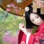 Placeholder: close up of stunning, gorgeous Japanese woman in traditional kimono with intricate flowers and jewels in hair, bamboo umbrella, mist, 8k, high-quality, ultrafine-detail, intricate, detailed matte, artwork, brian froud, howard lyon, anna dittmann, Greg Rutowski, alphonse mucha