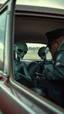 Placeholder: aliens sitting inside an old car doors are open and a policeman asking them for driving licenses