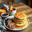 Placeholder: Prompt: "Golden potato pancakes stacked on a plate with a side of lingonberry jam and crispy pork slices, placed on a wooden table. Captured in 8K with a cozy Scandinavian ambiance."