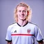 Placeholder: 85mm DSLR color photography of a very detailed headshot fitting all of head and hair in frame. 22-year-old Germen soccer player, with blonde hair color and no facial hair and with a small smile, grey background