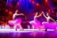 Placeholder: very beautiful a ballet male and female dancers couple in very pretty clothing dancing ,hyper realistic ,disco lights,very luxury dance stage ,with nice light sources and devices in stage, close up