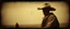 Placeholder: STYLE: gritty 19th-century gothic photography, Zdzisław Beksiński surrealism.Titian, Caravaggio chiaroscuro, tactile analog grain, pinhole-camera softness, heavy vignetting, scratched emulsion, rugged irregular photo border. SCENE: alien cowboy, completely absorbed in the mundane task.