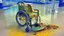 Placeholder: wheelchair covered in vomit at airport