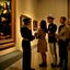 Placeholder: Mona Lisa comes out of the picture and kisses a young navy officer who is standing in the museum looking at her picture