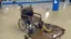 Placeholder: wheelchair covered in feces at airport