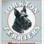 Placeholder: an orange circle containing a black and white image of a Scottish terrier