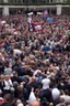 Placeholder: hundreds of people kneeling in front of donald trump