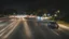 Placeholder: Night, cars on the road, shutter speed 1.6 seconds