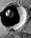 Placeholder: aerial lunar satellite image of a young impact crater with larger regolith along right ride. A damaged metallic alien sphere with fracture lines like an egg. organic growth across regolith and up crater walls. Along the lower frame edge a small modern bare-bones lunar-vehicle sits near the rim with visible wheel tracks. comic pencils