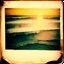 Placeholder: Photographic, Sea, soft waves, polaroid with damaged border, 1968, sunset, scotch tape on the border, scribblings, Coffee stain