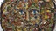 Placeholder: A mosaic artwork made up of unexpected objects, such as candy wrappers, bottle caps, and buttons. Highly detailed and intricate, with a mix of realistic and abstract elements. By artist Vik Muniz.