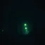 Placeholder: The atmosphere is eerie, suffocating, and raw, with the feeling that the camera operator is witnessing something forbidden and legendary — a colossal being that has been hiding for ages, suddenly revealed. The image must feel authentic and unpolished — like amateur footage captured in real time. Prioritize pixelation, color noise, digital compression artifacts, motion blur, and the unsettling atmosphere of being near a gigantic shadow-creature at night. Do not stylize or modernize.