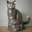 Placeholder: cat made of cat food cans