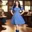 Placeholder: [high res suggestive photo by Russ Meyer] Kat Dennings (max black 2 broke girls) as Dorothy Gale in her revealing blue Gingham dress , she stand in her old boots: the queen of the dance floor, having fn in the Gangnam Style! PSY