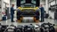 Placeholder: A car repair shop where two people in work clothes are repairing a black and yellow Benz CLS 550 with an eye-catching theme in a sophisticated and special repair shop where at the bottom of the image a collection of car engine parts is arranged on the floor