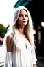 Placeholder: a fashion magazin photo of a beautiful supermodel with long white hair, garden city, summer dress, street photography, detailed, 8k, morning, soft light, bokeh, cool tones, blue sky