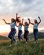 Placeholder: a group of Turkish young ladies in sports pants and blouse are dancing in high grassy hills ,cloudy sun set sky