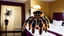 Placeholder: 2 adults running in hotel room because of escaped tarantula