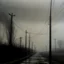 Placeholder: An empty road on a misty day. Telegraph poles and wires. Muted tones. Tilted horizon. With blotches and lens noise. Hyper realistic Photo 4k