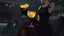 Placeholder: midle close up gray-toned, contrasting graphics, a lady in a black casual dress, black lace nice nylon stockings sitting on a bar chair in bar, holding a yellow mimosa cocktail in her long black gloved hand, atmospheric, strong contrasts, shadowy background, focus on the hand holding the cocktail, moody, pale ligts, anime style, cinematic