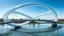 Placeholder: A breathtaking pedestrian bridge with a double helix design, curving elegantly over a calm river. The entire structure is made of transparent glass, giving the illusion that the bridge is floating above the water. The twisted helical shape reflects the sunlight, casting intricate shadows on the river’s surface. Award-winning photograph.