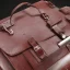 Placeholder: Luxury leather briefcase bag with weed bong