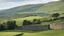 Placeholder: Beautiful landscape in the English Yorkshire Dales, hills, fields, rural buildings, stone walls, balance, chiaroscuro, peace, tranquillity, beautiful light and colour