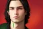 Placeholder: a young male with shoulder length black hair and green eyes, slight smile