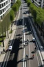 Placeholder: birds eye view of a street with one way traffic, a cycle lane and a path