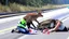 Placeholder: lady giving CPR to injured deer on highway I90