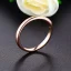 Placeholder: delicate thin ring with baguette diamond, knot, rose gold, thin ring