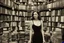 Placeholder: full-height shot of a woman in a tight black dress, inside a large magic book shop, books, bottles, windows